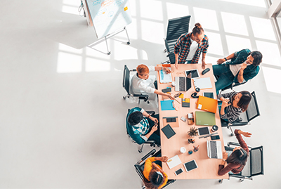 Students Working Around a Desk