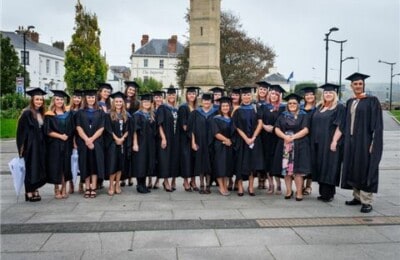 A group photo of North Devon College graduates