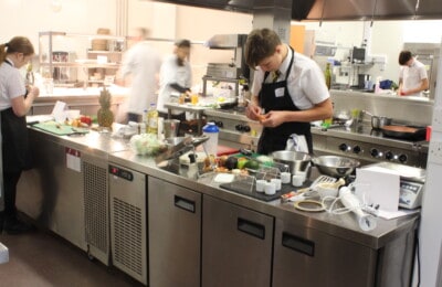 Students preparing food in North Devon College kitchens