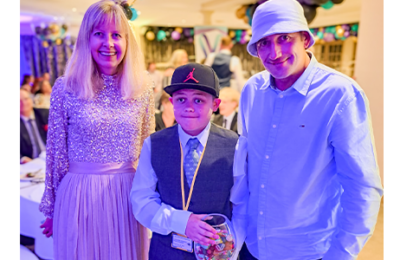 Award winner with his teacher and parent