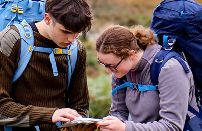 Two DofE students looking at a map