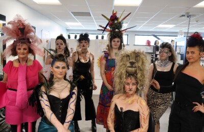 Group of models for our hair showcase catwalk styled with a safari theme